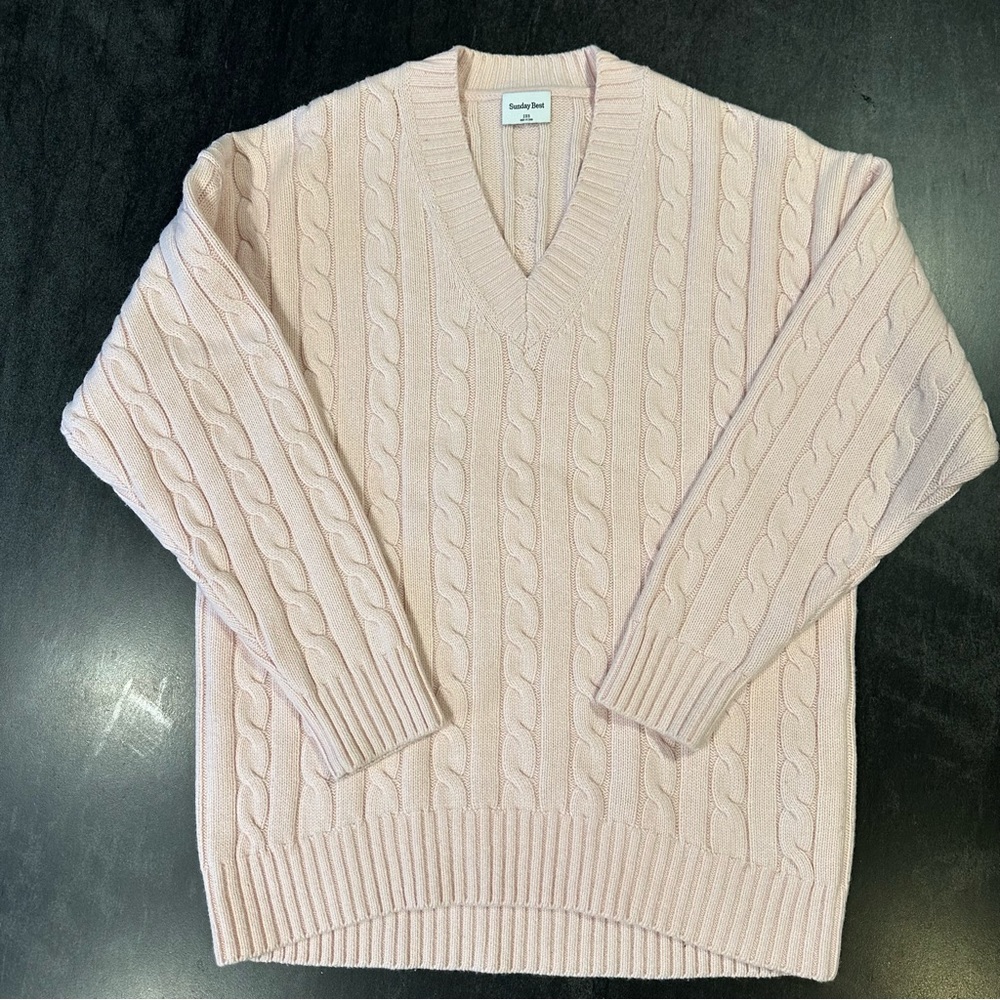Sunday Best Peggy V-Neck
Merino Wool Cable Knit Sweater by Aritzia
